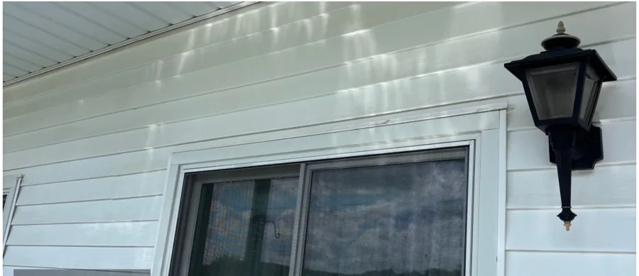 Vinyl siding soft wash