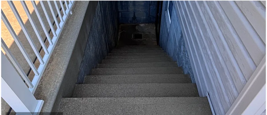 Concrete basement stairwell