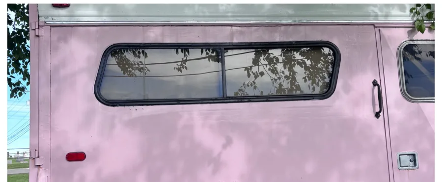 Camper rear window panel