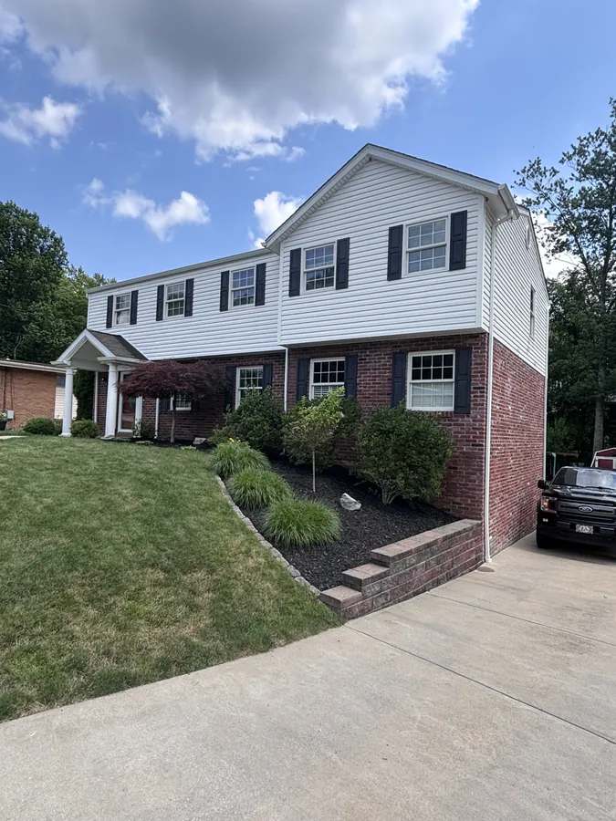 White colonial after house wash
